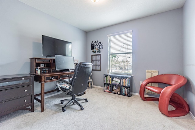 office area with baseboards and carpet