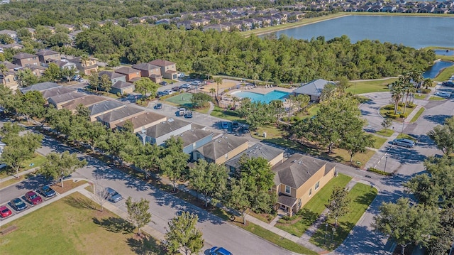bird's eye view with a water view and a residential view