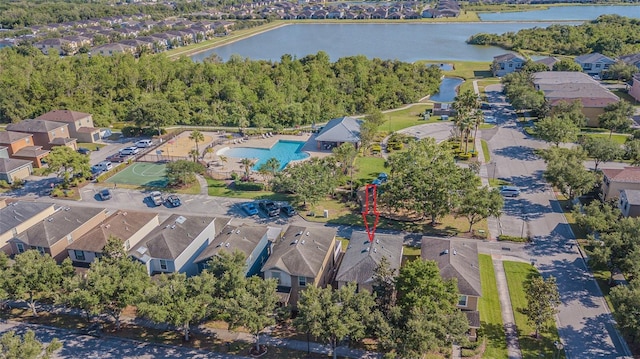 bird's eye view with a residential view and a water view