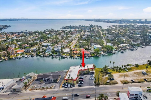 drone / aerial view featuring a water view