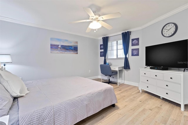 bedroom with light wood-style floors, baseboards, ornamental molding, and a ceiling fan