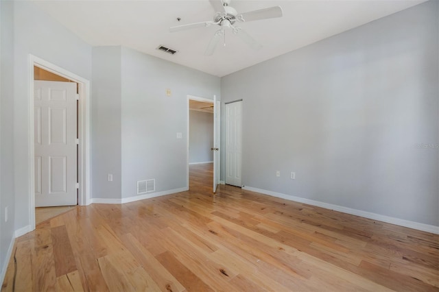 10103 Courtney Oaks Cir Unit 103, Tampa, FL 33619 - interior space with visible vents, light wood-type flooring, and baseboards