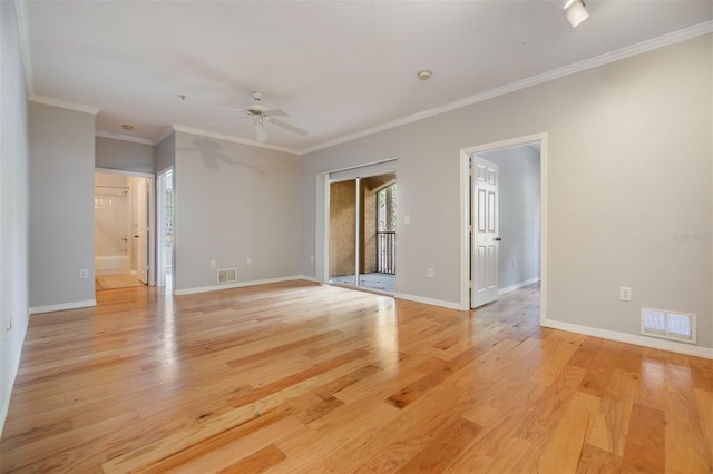 10103 Courtney Oaks Cir Unit 103, Tampa, FL 33619 - unfurnished room with visible vents, ceiling fan, light wood finished floors, and baseboards