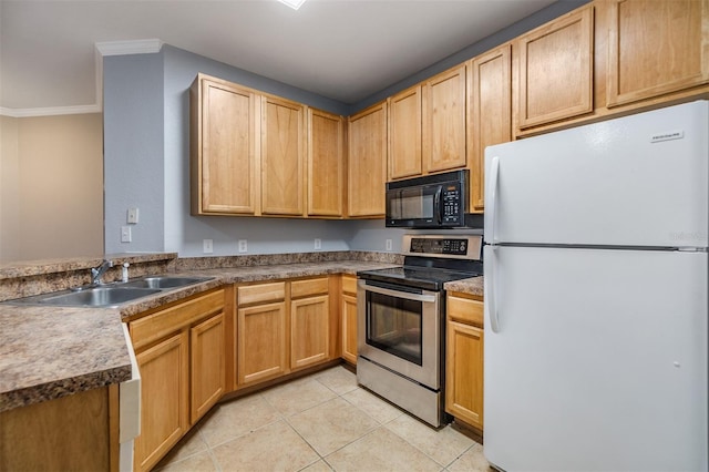 10103 Courtney Oaks Cir Unit 103, Tampa, FL 33619 - kitchen with freestanding refrigerator, black microwave, ornamental molding, a sink, and stainless steel electric range