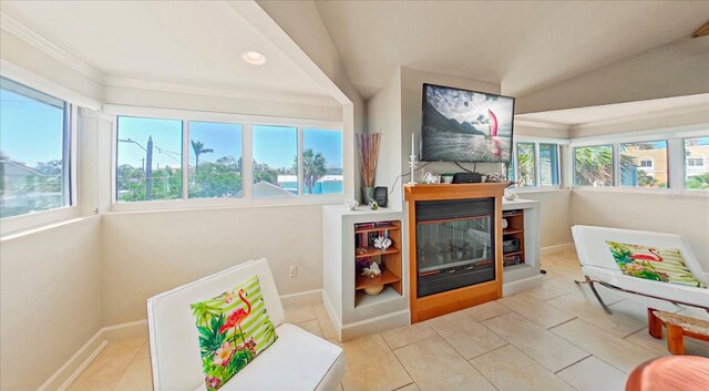 118 94th Ave, Treasure Island, FL 33706 - sitting room with baseboards, recessed lighting, tile patterned flooring, and a glass covered fireplace