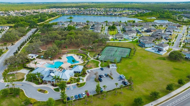 bird's eye view with a residential view and a water view