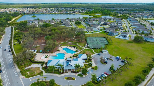 bird's eye view with a water view and a residential view