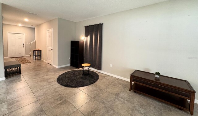 12717 Lemon Pepper Dr, Riverview, FL 33578 - sitting room featuring tile patterned flooring and recessed lighting