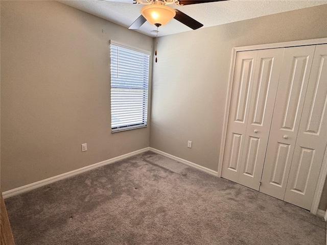 12717 Lemon Pepper Dr, Riverview, FL 33578 - unfurnished bedroom featuring carpet floors, a closet, and a ceiling fan