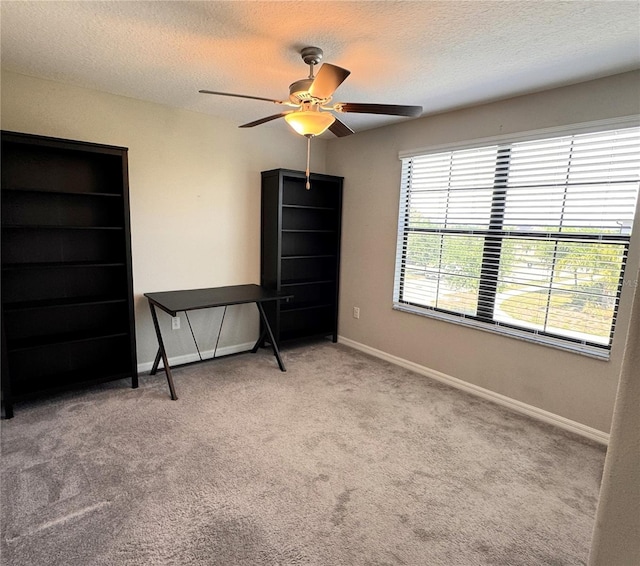 12717 Lemon Pepper Dr, Riverview, FL 33578 - carpeted bedroom featuring a textured ceiling and ceiling fan