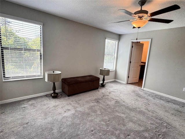 12717 Lemon Pepper Dr, Riverview, FL 33578 - carpeted bedroom with a textured ceiling and ceiling fan