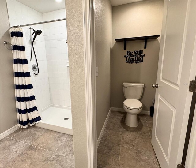 12717 Lemon Pepper Dr, Riverview, FL 33578 - bathroom featuring a shower stall and tile patterned floors