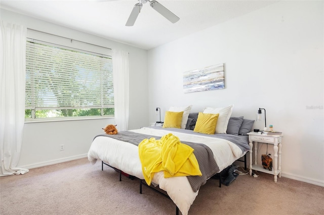 1105 Venetian Harbor Dr NE, Saint Petersburg, FL 33702 - carpeted bedroom featuring baseboards and a ceiling fan