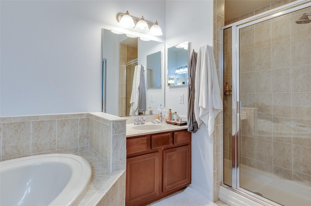 1105 Venetian Harbor Dr NE, Saint Petersburg, FL 33702 - bathroom featuring a stall shower, a garden tub, and vanity
