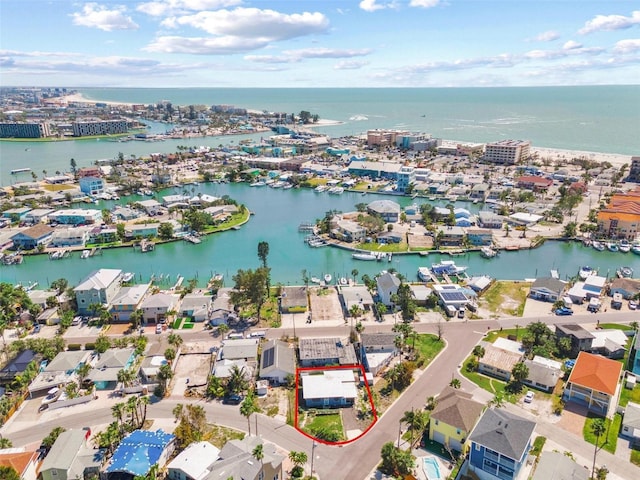 birds eye view of property featuring a residential view and a water view