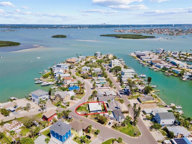 aerial view featuring a water view and a residential view