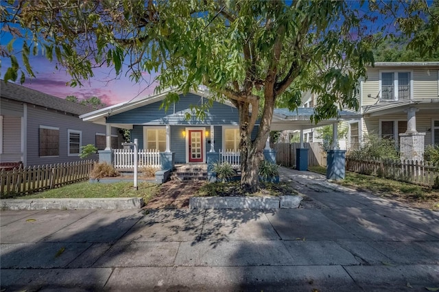 2920 N 11th St, Tampa, FL 33605 - view of front of house featuring a porch, fence, and driveway