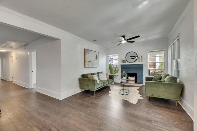 2920 N 11th St, Tampa, FL 33605 - living room with crown molding, wood finished floors, a brick fireplace, and a ceiling fan