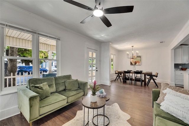 2920 N 11th St, Tampa, FL 33605 - living area featuring hardwood / wood-style flooring, baseboards, and ornamental molding