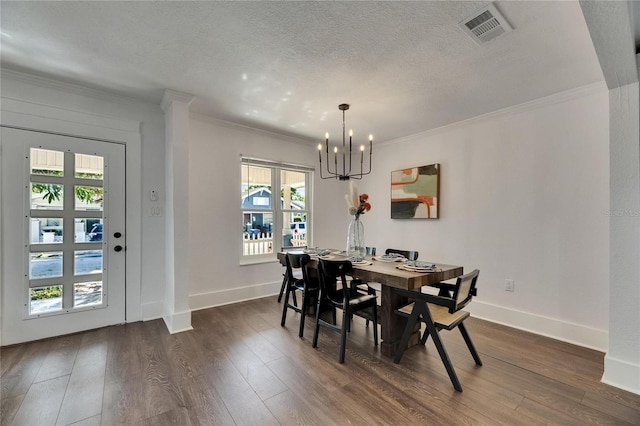 2920 N 11th St, Tampa, FL 33605 - dining room with ornamental molding, a notable chandelier, dark wood-style floors, and visible vents