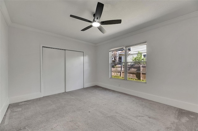 2920 N 11th St, Tampa, FL 33605 - unfurnished bedroom featuring crown molding, a closet, and carpet