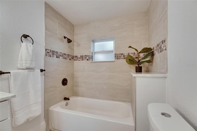 2920 N 11th St, Tampa, FL 33605 - full bathroom with toilet, a textured wall, shower / tub combination, and vanity