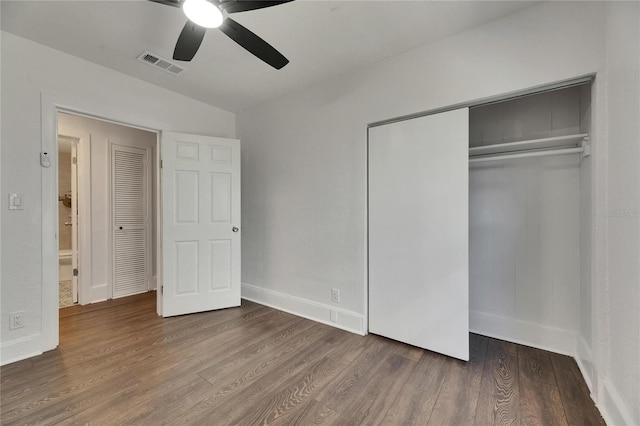 2920 N 11th St, Tampa, FL 33605 - unfurnished bedroom featuring a closet, baseboards, a ceiling fan, visible vents, and wood finished floors