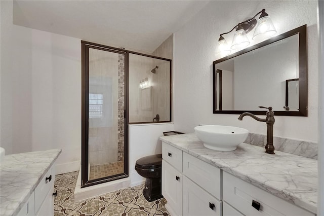2920 N 11th St, Tampa, FL 33605 - full bath with tile patterned flooring, toilet, a stall shower, and vanity