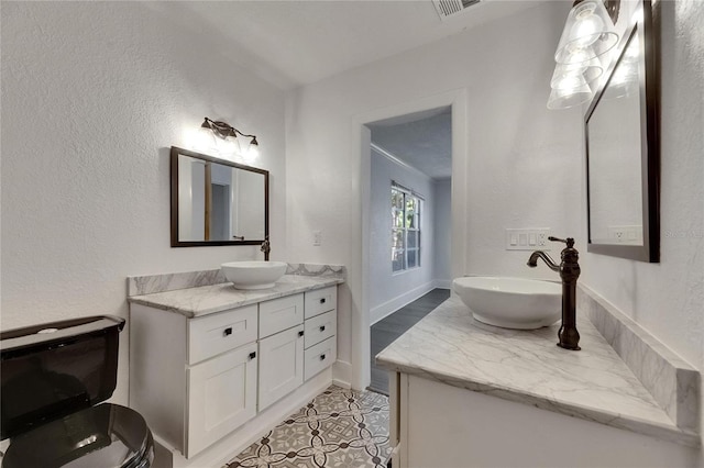 2920 N 11th St, Tampa, FL 33605 - full bathroom featuring tile patterned floors, vanity, and visible vents