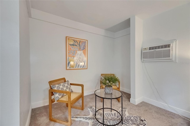 2920 N 11th St, Tampa, FL 33605 - living area featuring a wall mounted AC, baseboards, and carpet