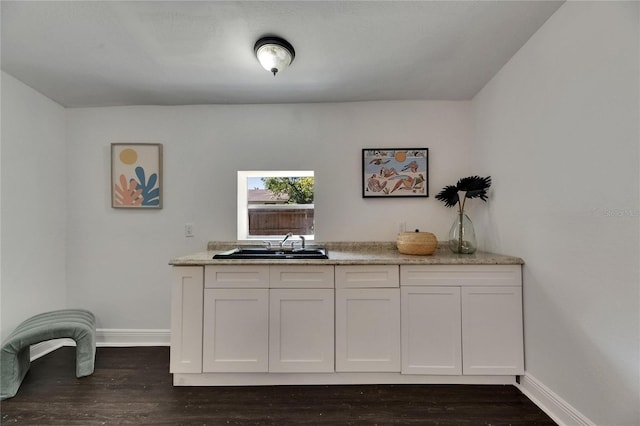 2920 N 11th St, Tampa, FL 33605 - interior space with dark wood-type flooring, baseboards, and a sink