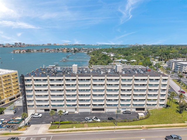 aerial view featuring a view of city and a water view