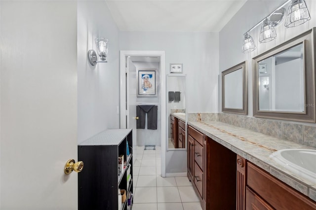 bathroom with vanity and tile patterned flooring