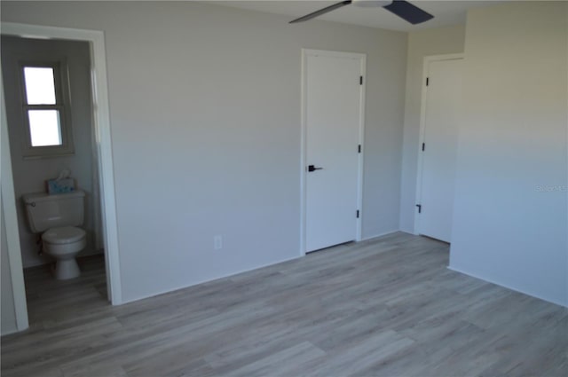 unfurnished bedroom featuring ceiling fan and wood finished floors