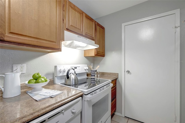 kitchen with light countertops, white range with electric stovetop, and under cabinet range hood