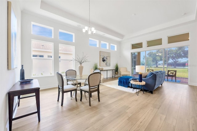 sunroom with a notable chandelier