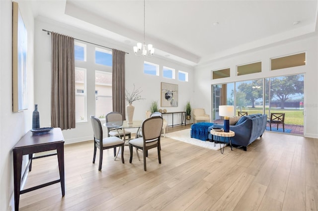 sunroom with a notable chandelier