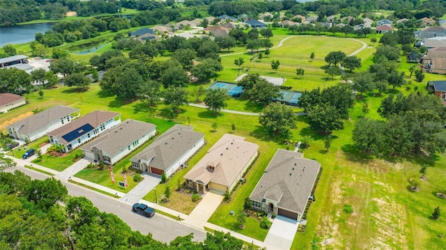 bird's eye view with a residential view and a water view