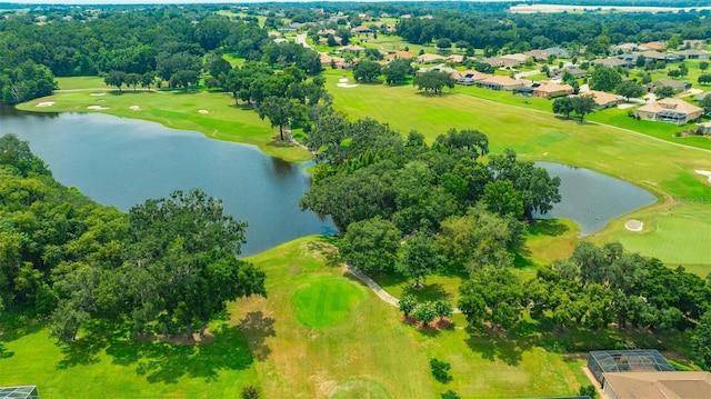 bird's eye view featuring golf course view, a residential view, and a water view