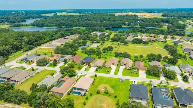 bird's eye view featuring a residential view and a water view