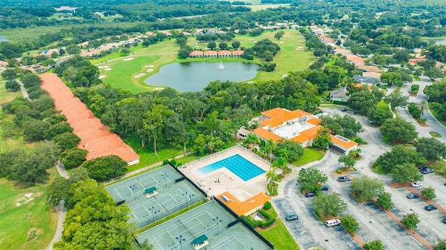 aerial view with a water view and golf course view