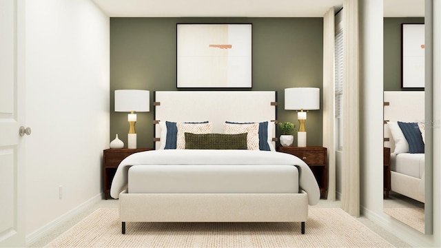 carpeted bedroom featuring baseboards