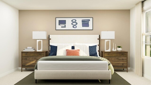 carpeted bedroom featuring baseboards