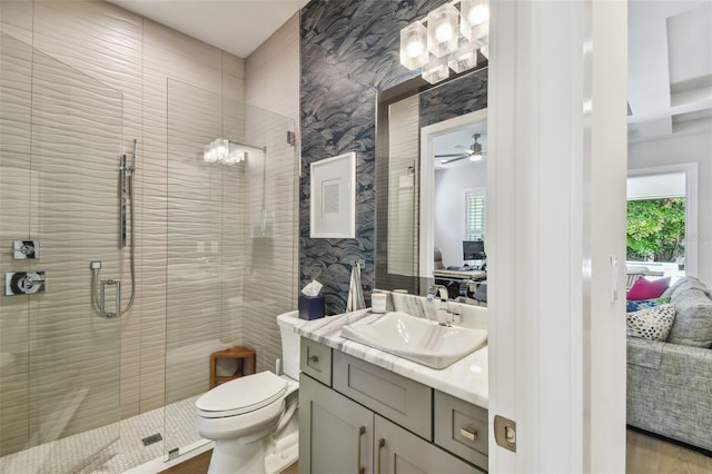 3607 W Roland St, Tampa, FL 33609 - ensuite bathroom featuring toilet, a shower stall, a wealth of natural light, and connected bathroom