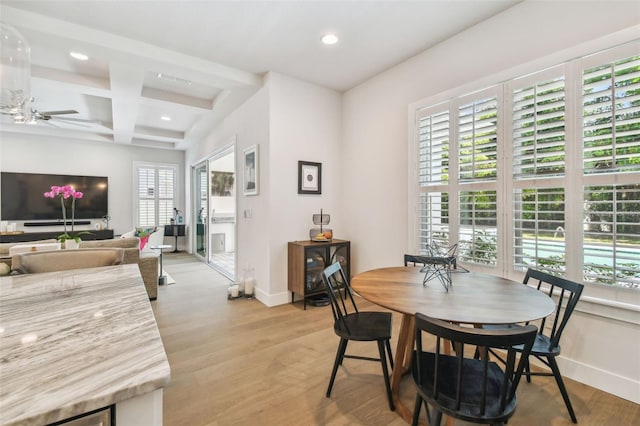 3607 W Roland St, Tampa, FL 33609 - dining area with baseboards, beamed ceiling, and a wealth of natural light