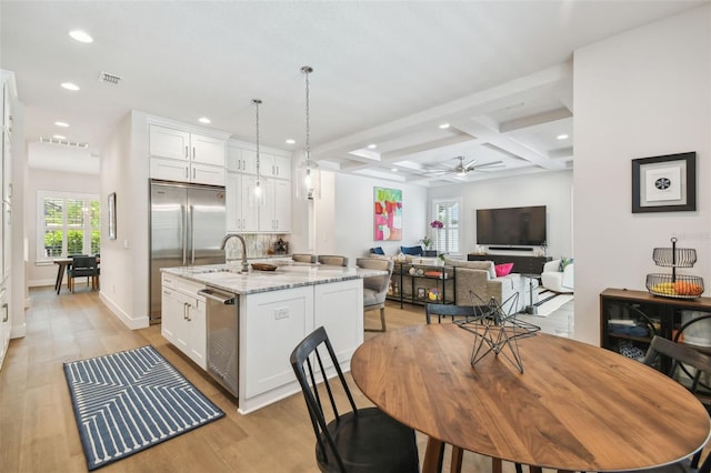 3607 W Roland St, Tampa, FL 33609 - kitchen with white cabinetry, recessed lighting, and coffered ceiling