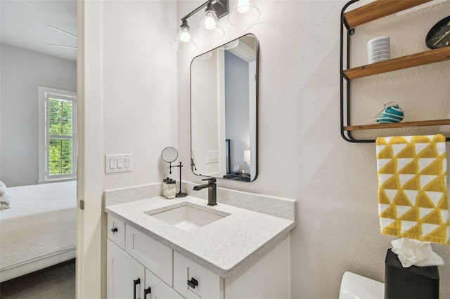 3607 W Roland St, Tampa, FL 33609 - half bath with toilet, ensuite bathroom, and vanity
