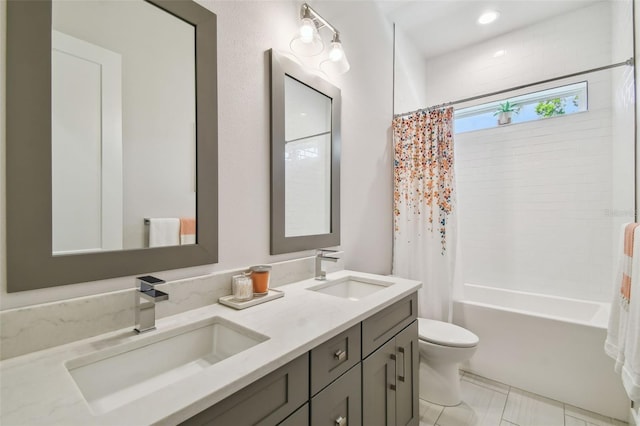 3607 W Roland St, Tampa, FL 33609 - full bath with shower / bath combo, toilet, double vanity, and a sink