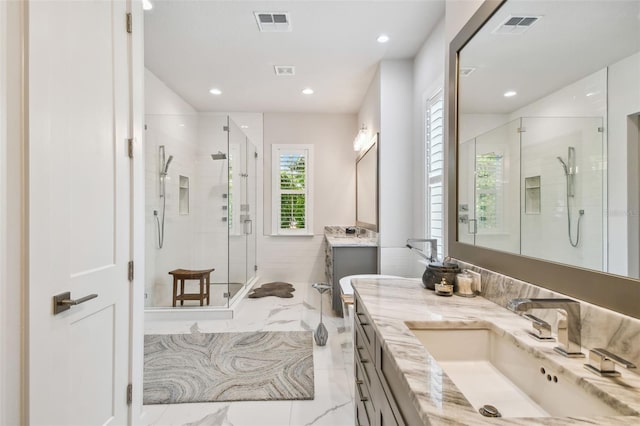 3607 W Roland St, Tampa, FL 33609 - full bathroom with visible vents, a stall shower, recessed lighting, and vanity