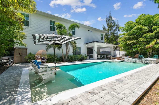 3607 W Roland St, Tampa, FL 33609 - view of pool with a patio and a pool with connected hot tub